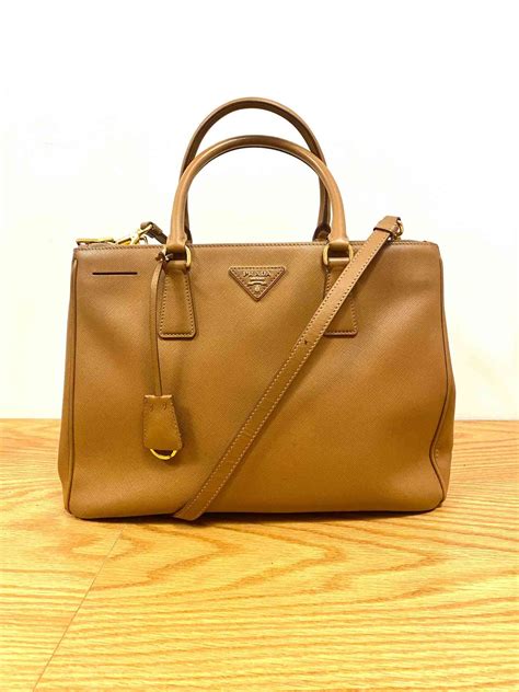 original bolsa prada|farfetch Prada bolsas.